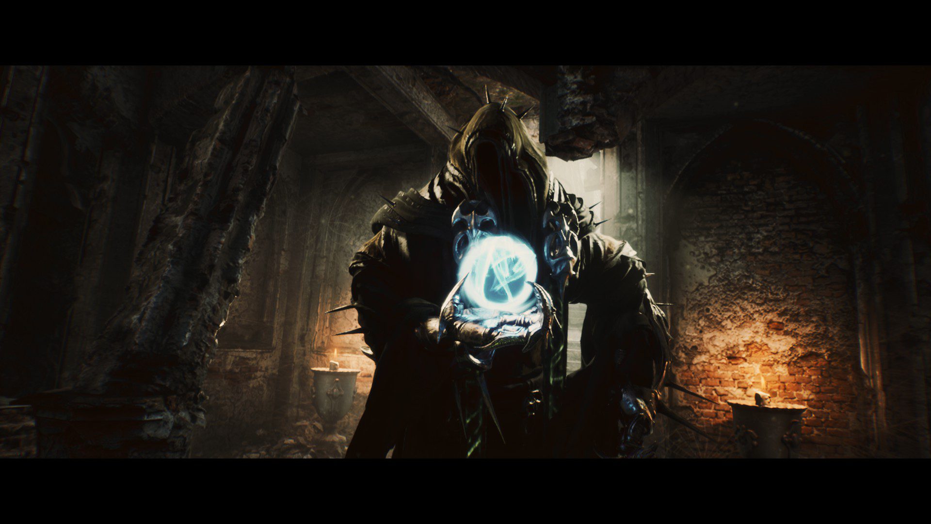 The character of death, a hooded ghostly creature, holding an orb