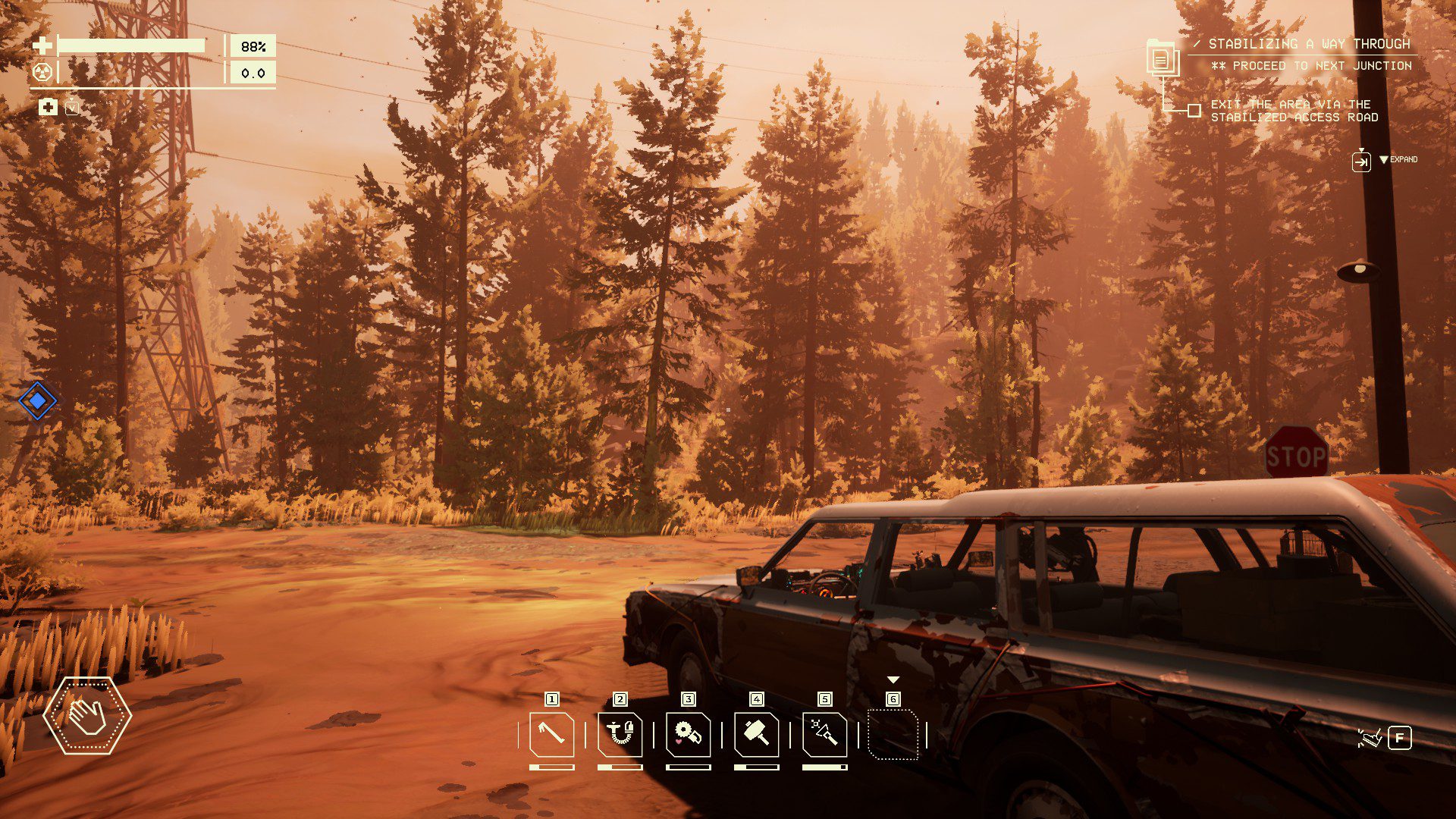 An orange sunlight over a forest, with the car on the side of the screenshot