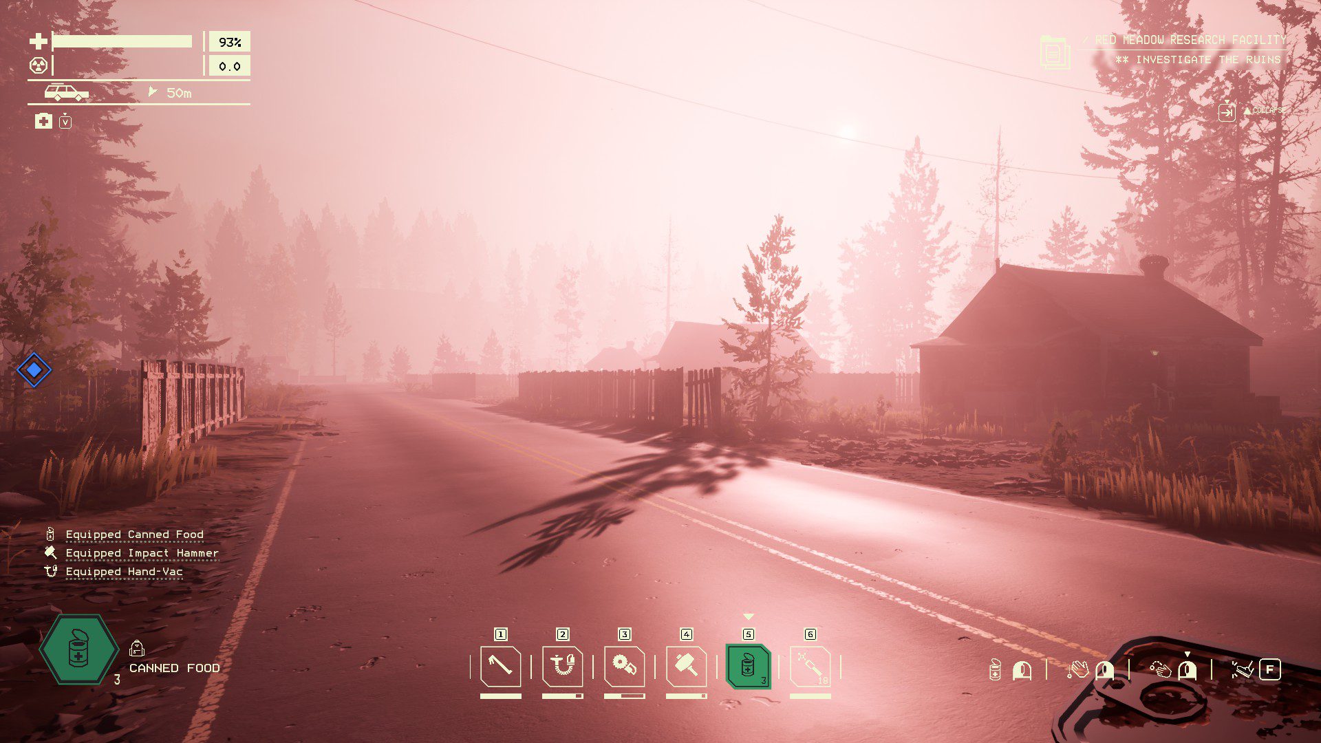 A pink light over a small neighborhood
