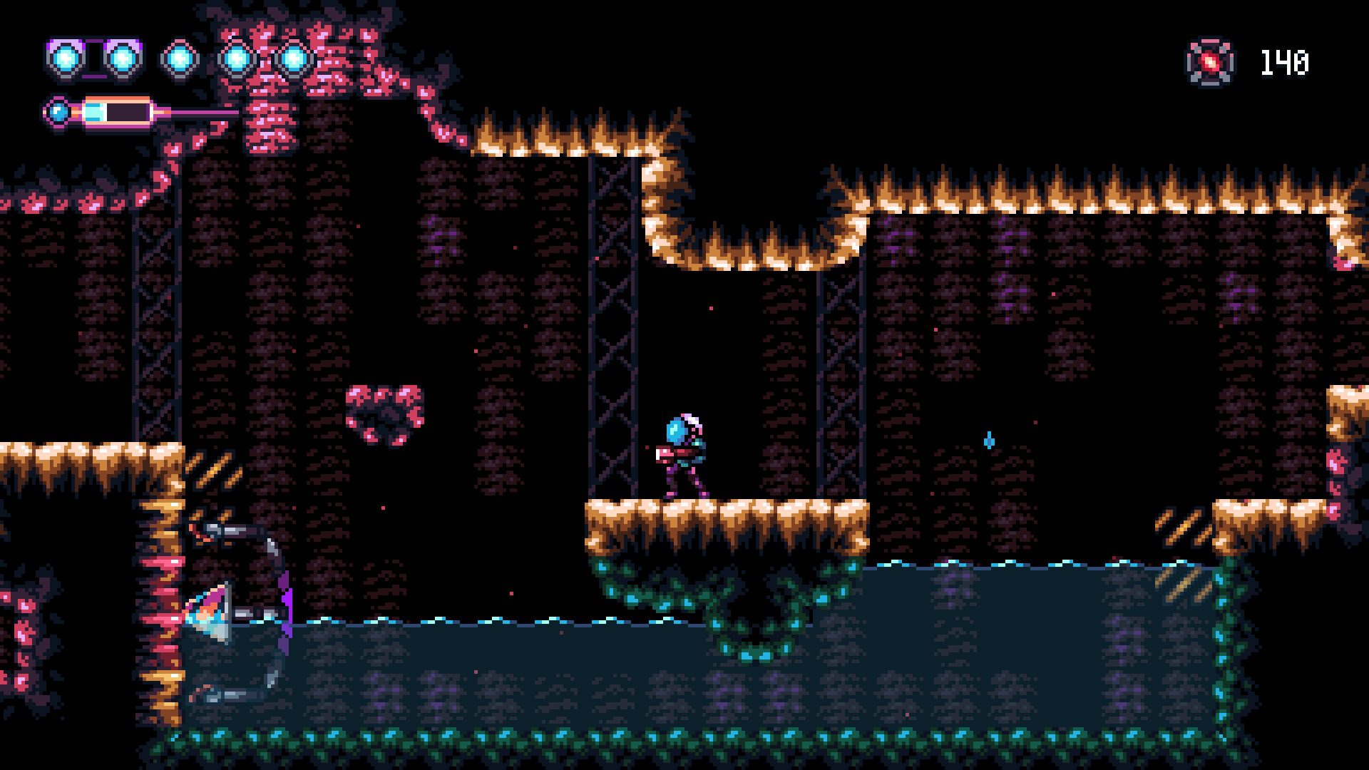 ReTraTile A brown tileset, a drill robot in the bottom left, water below