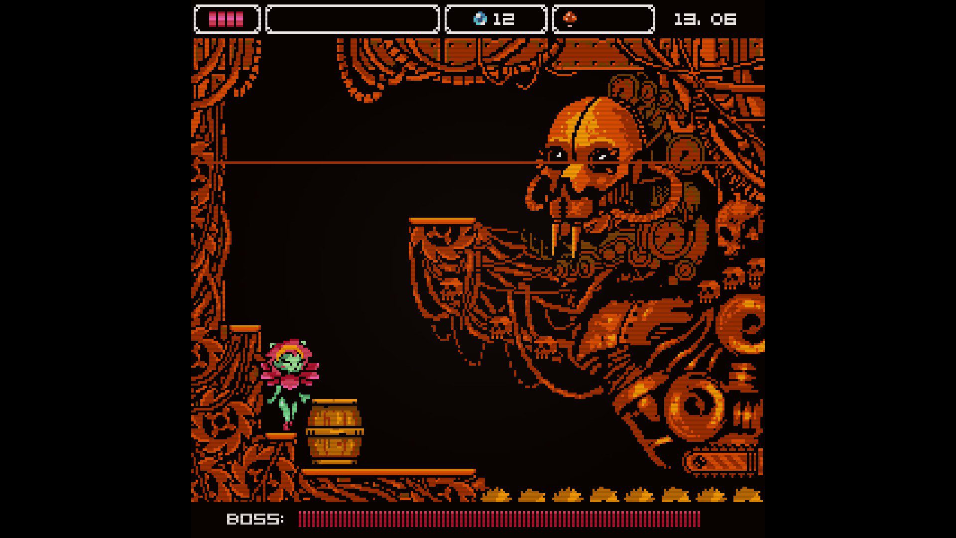 AatNBoss An orange skull tangled in a mechanical mess surrounding the screen