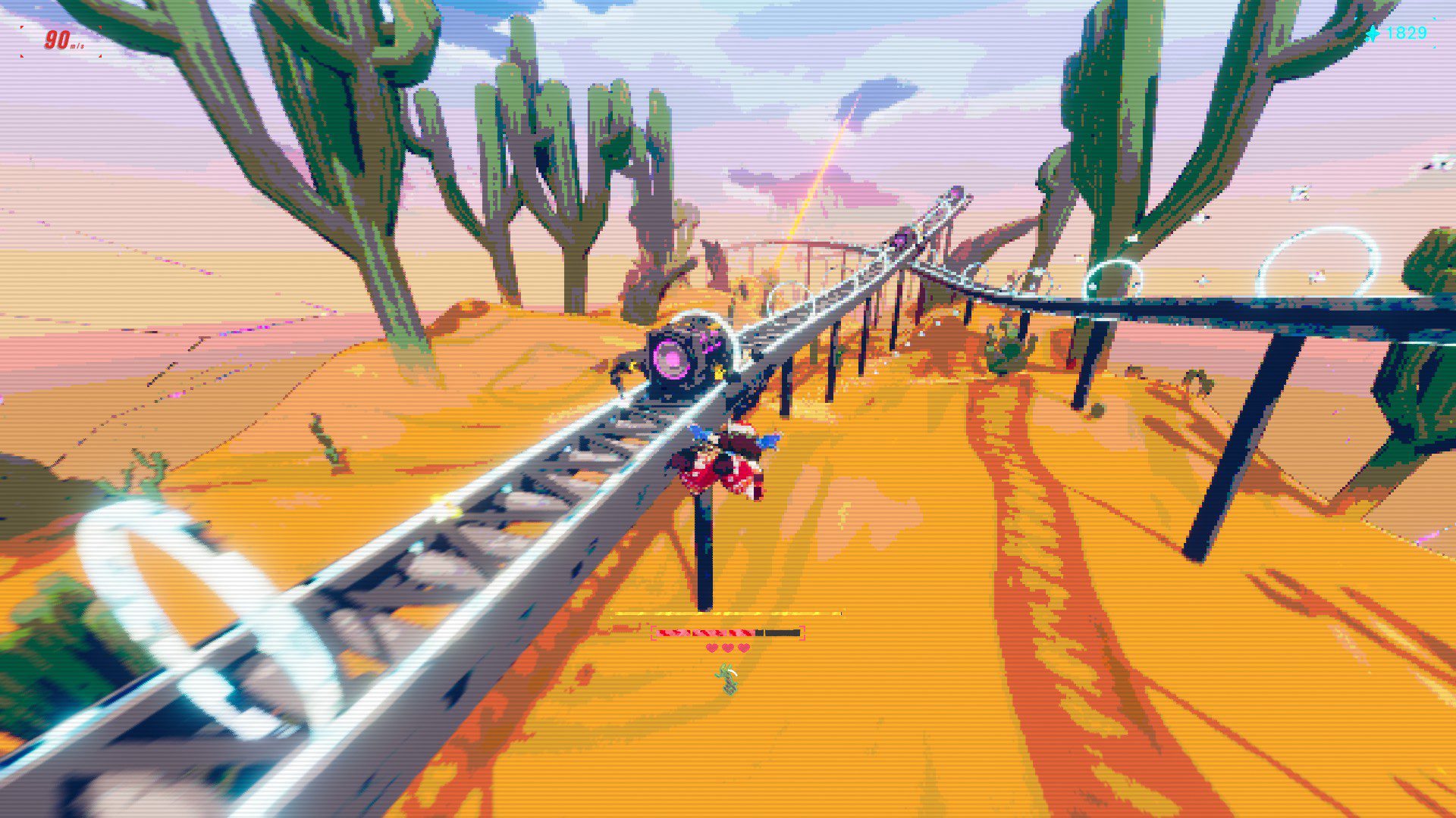 A pixelated screen of a desert path ahead of Zoe, with train tracks on the left and right