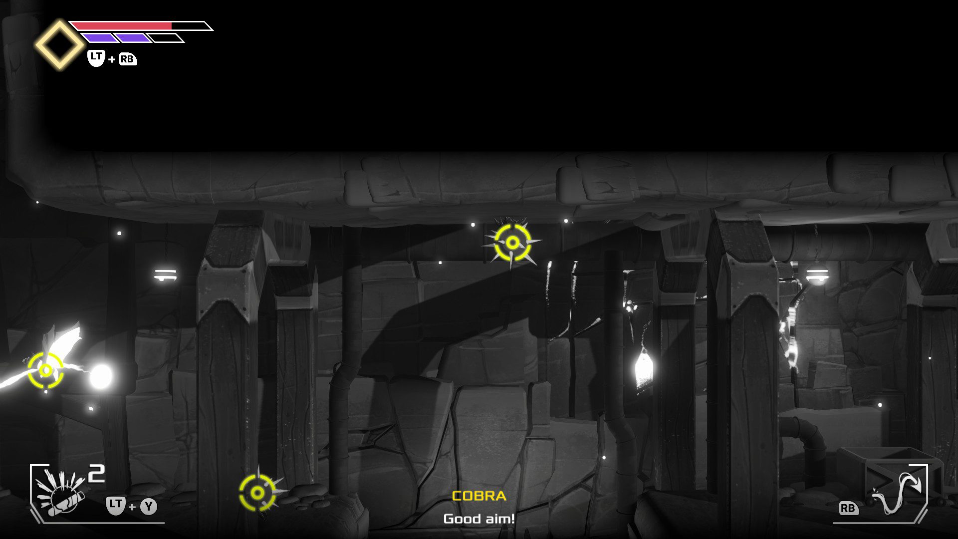 A guided shot targeting two bats and a spiky crab on the ceiling