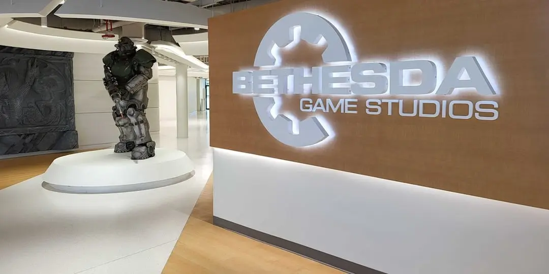 Interior view of Bethesda Game Studios with logo and statue.