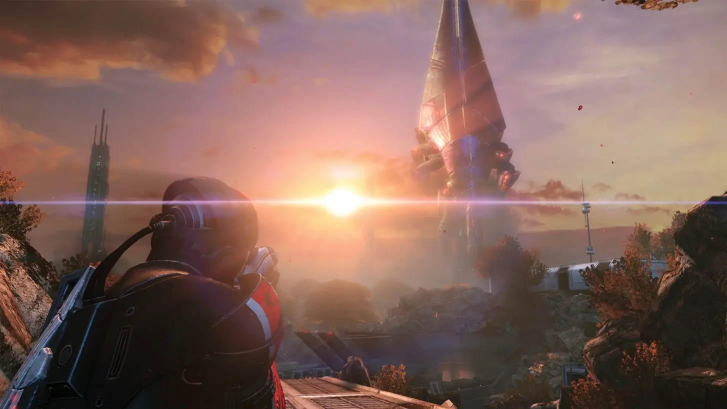 A character in futuristic armor looking toward a massive spire and city under a glowing sunset sky