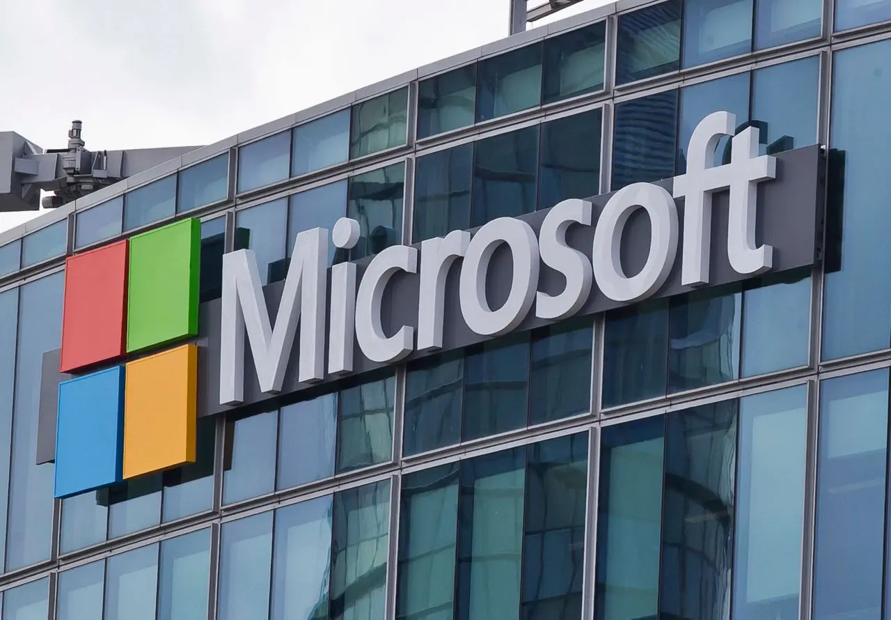 Microsoft logo on the facade of an office building.