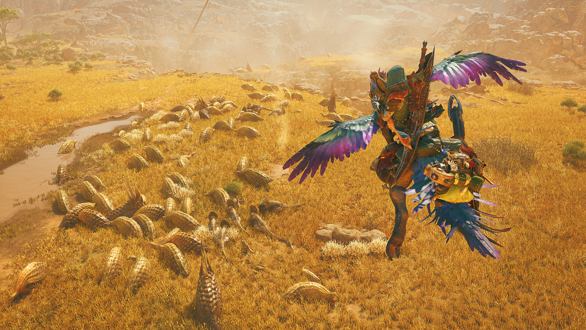 A hunter facing a massive monster on a stormy plain in Monster Hunter Wilds, an official Capcom press image.